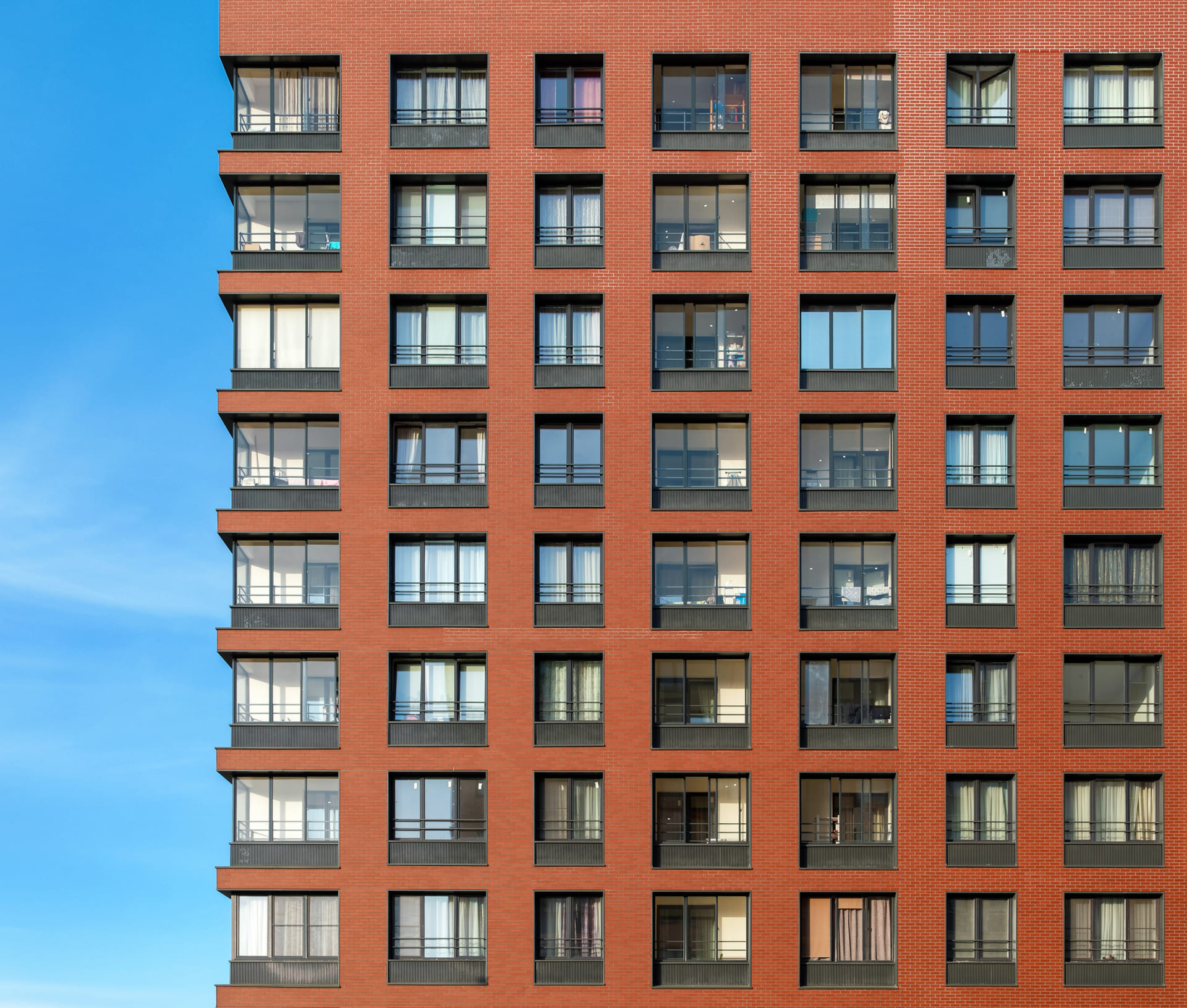 the-modern-brick-facade-of-a-high-rise-building-2024-10-16-03-57-55-utc (1)